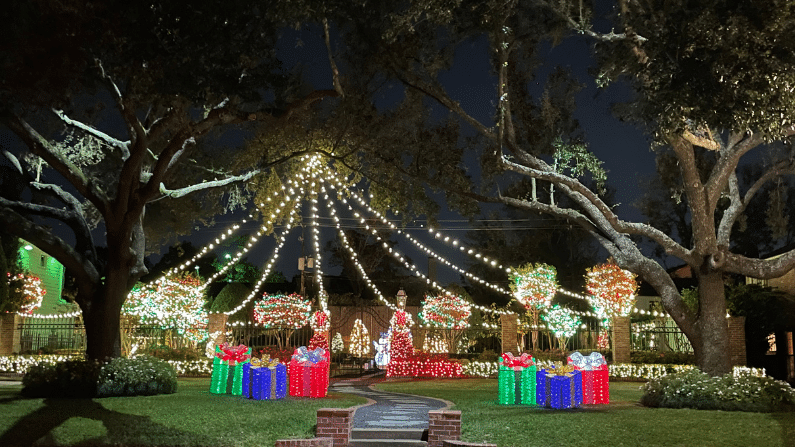 Colorful presents Christmas lights in River Oaks